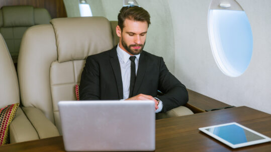 Businessman in a private jet