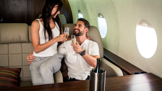 couple on a private jet