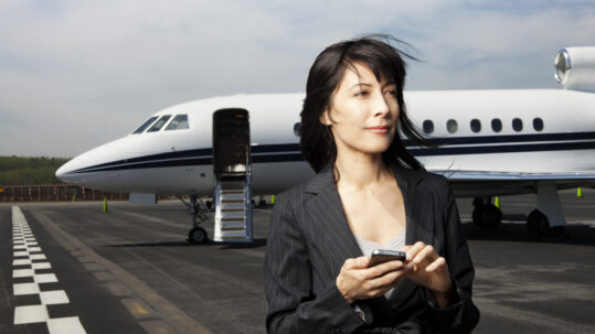 Woman in front of aircraft
