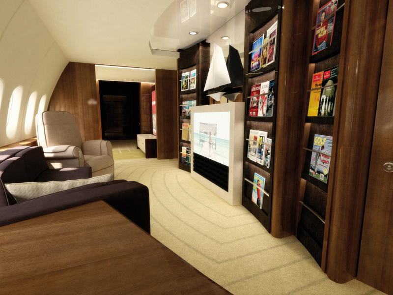 Large luxury private jet cabin with a large tv and entertainment center at AIME-Aircraft Interiors Middle East.