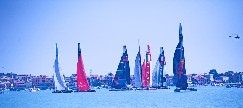 Multiple yachts racing for the America's Cup.