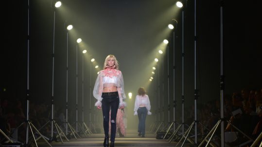 Female model walking the runway at Australian Fashion Week.