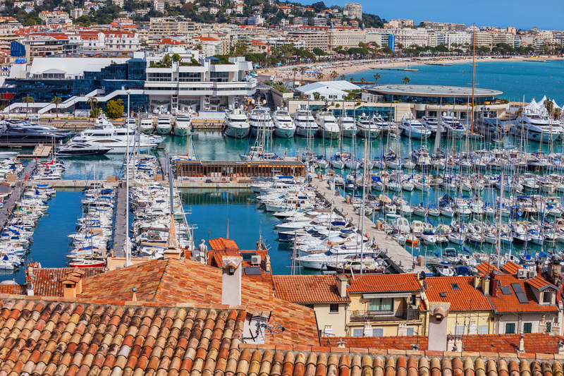 Yachts and superyachts docked at the Cannes Yachting Festival.