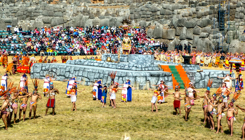People wearing traditional garb in Cusco Peru while celebrating the December Solstice.