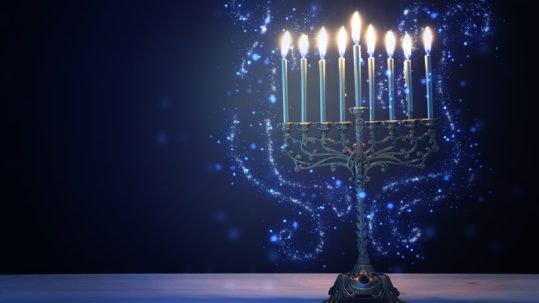 Menorah lit for Hanukkah.