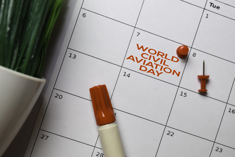 International Civil Aviation Day written on a calendar in red marker.