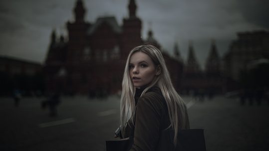 Model in front of Red Square during Moscow Fashion Week.