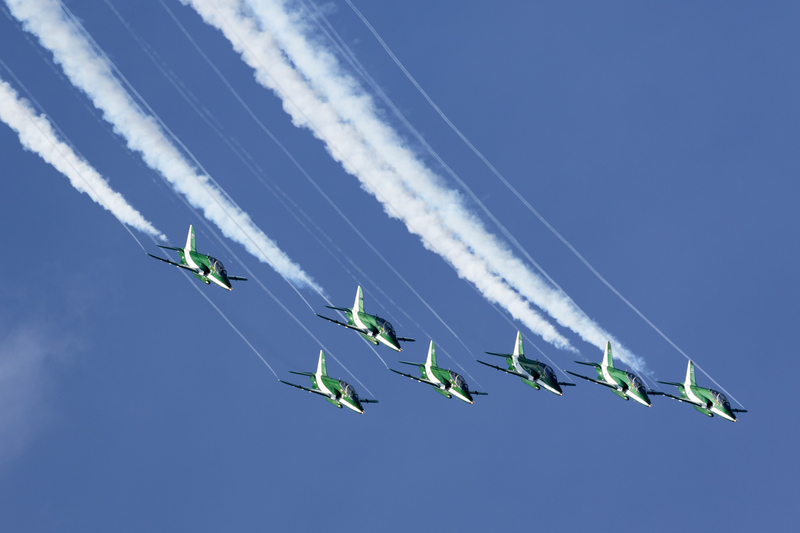 Fighter jets flying in formation above the Saudi International Airshow.