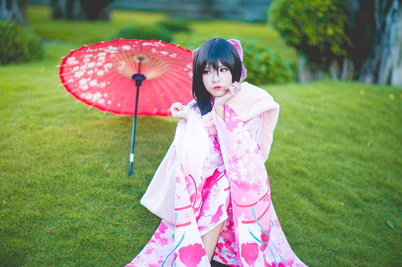 Japanese girl in kimono at a park during Tokyo Fashion Week.