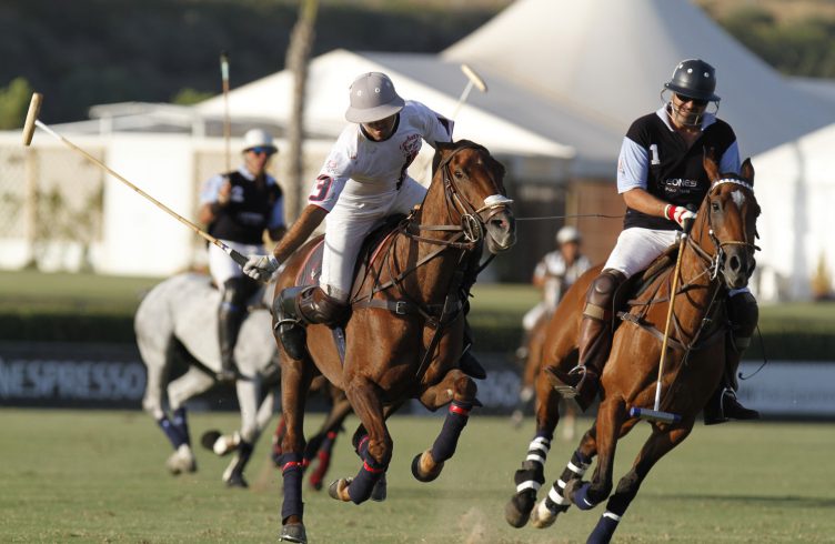 Riders on horses competing at the Tortugas Open Polo Championship.