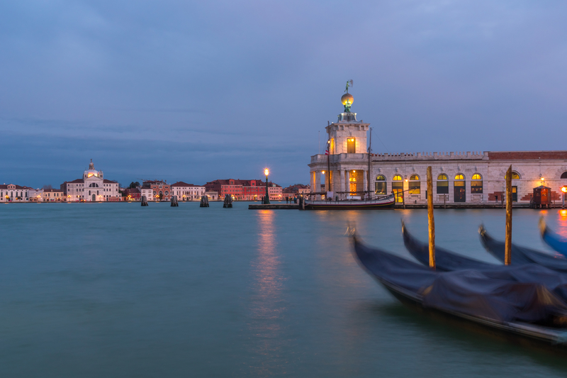 Venive and gondolas at dusk during the Venice Biennale Festival.