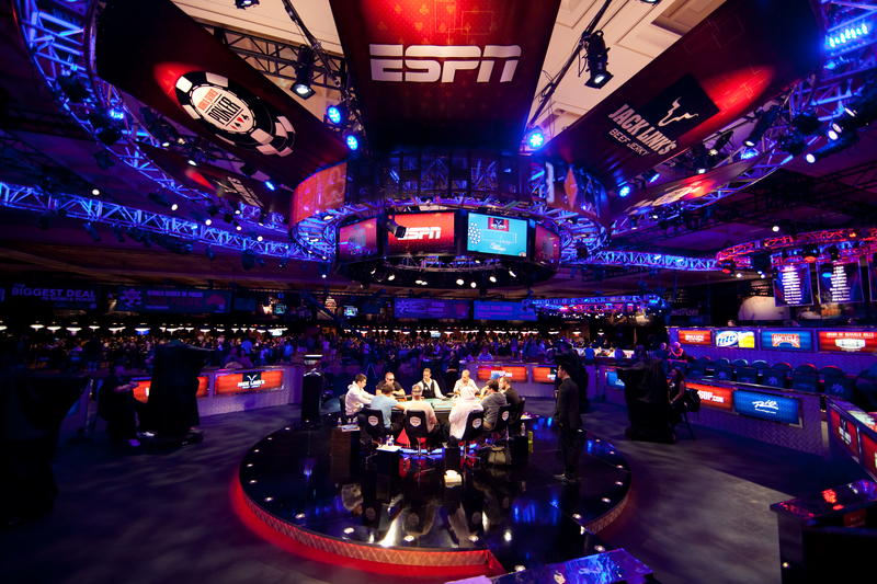 In a casino, poker players playing at the final table of the World Series of Poker WSOP Main Event.