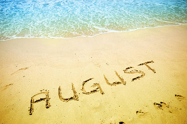 August carved into a sandy beach with turquoise ocean water above for August events.