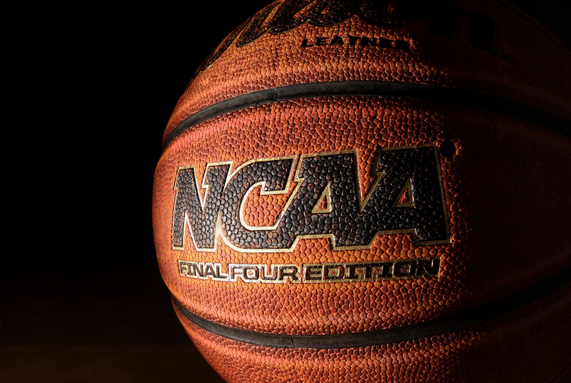 Basketball with a black background at the NCAA Final Four.