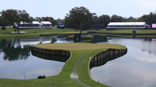 Iconic island green surrounded by the pond at TPC Sawgrass during The Players Championship.