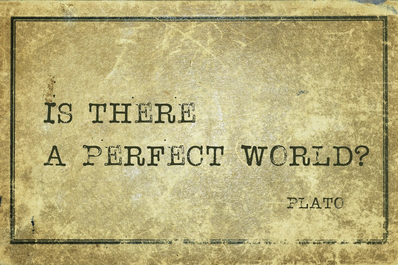 'Is there a perfect world?'- ancient Greek philosopher Plato utopia quote printed on grunge vintage cardboard.